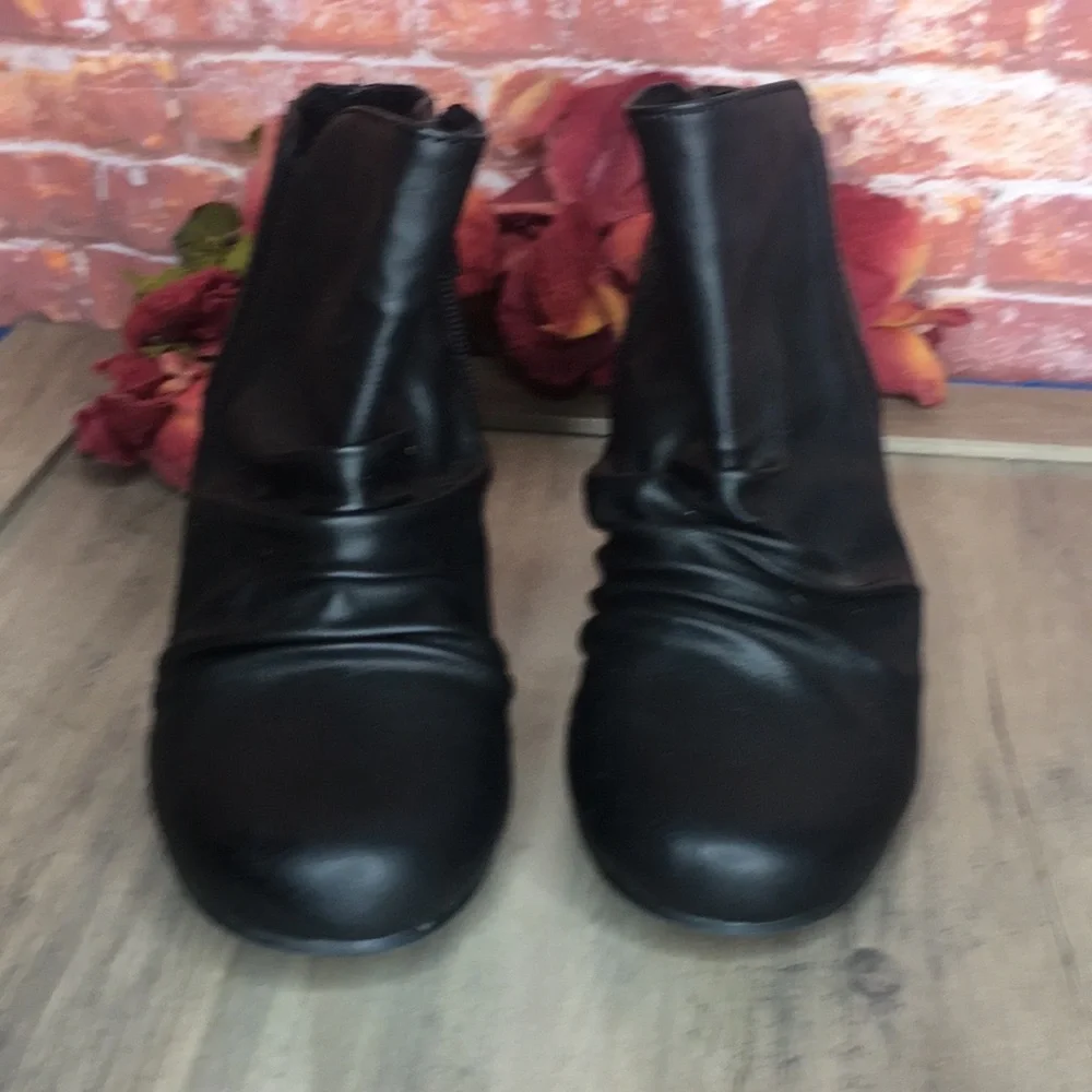Blowfish’s Malibu Black Slouchy Faux Leather Wedge Ankle Booties